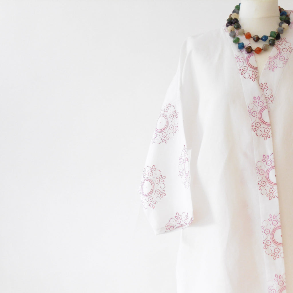 White linen kimono jacket wide sleeve detail showing hand block printed mandala motif