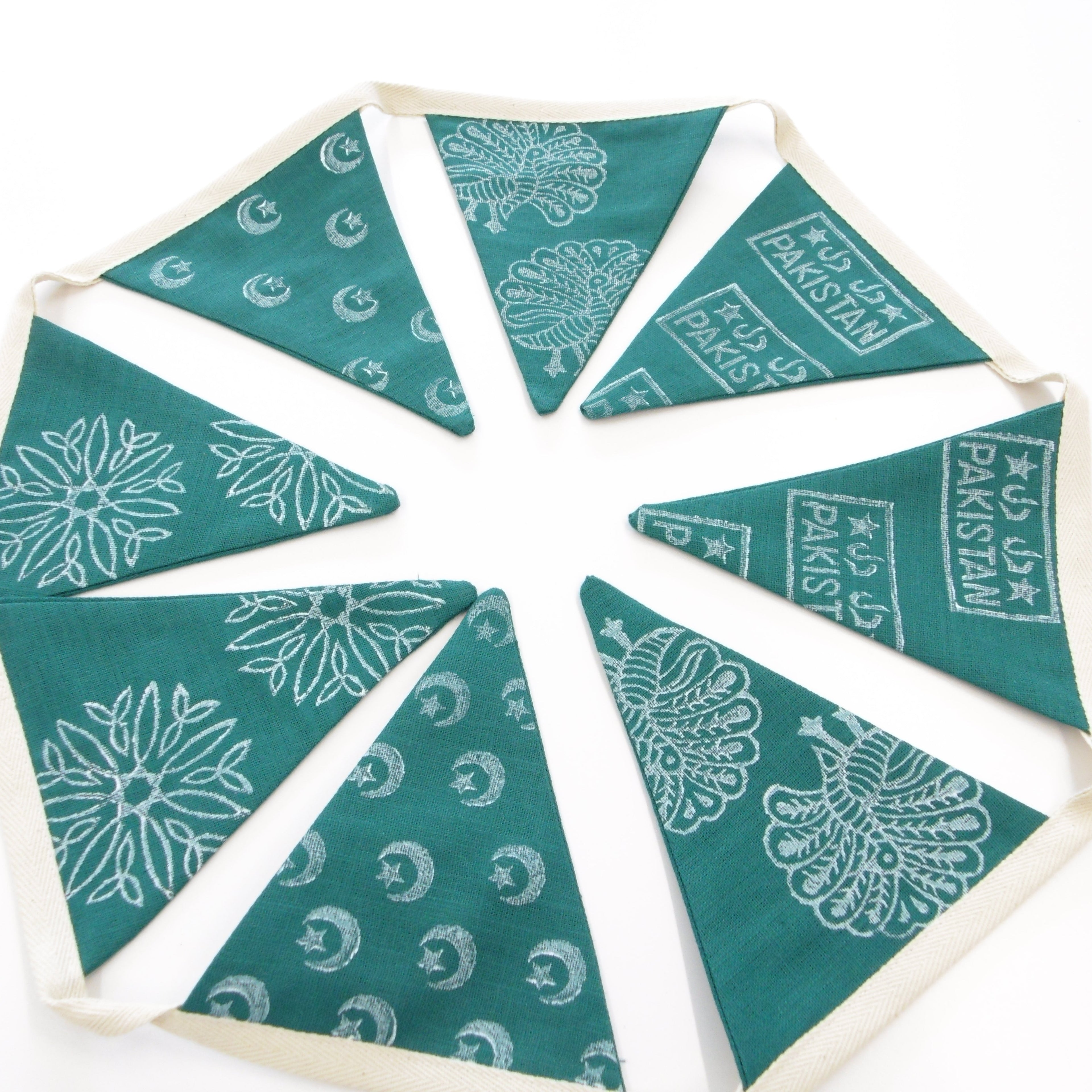 Hand block printed Pakistan Independence Day linen bunting with Dil Dil Pakistan stamp and star motifs