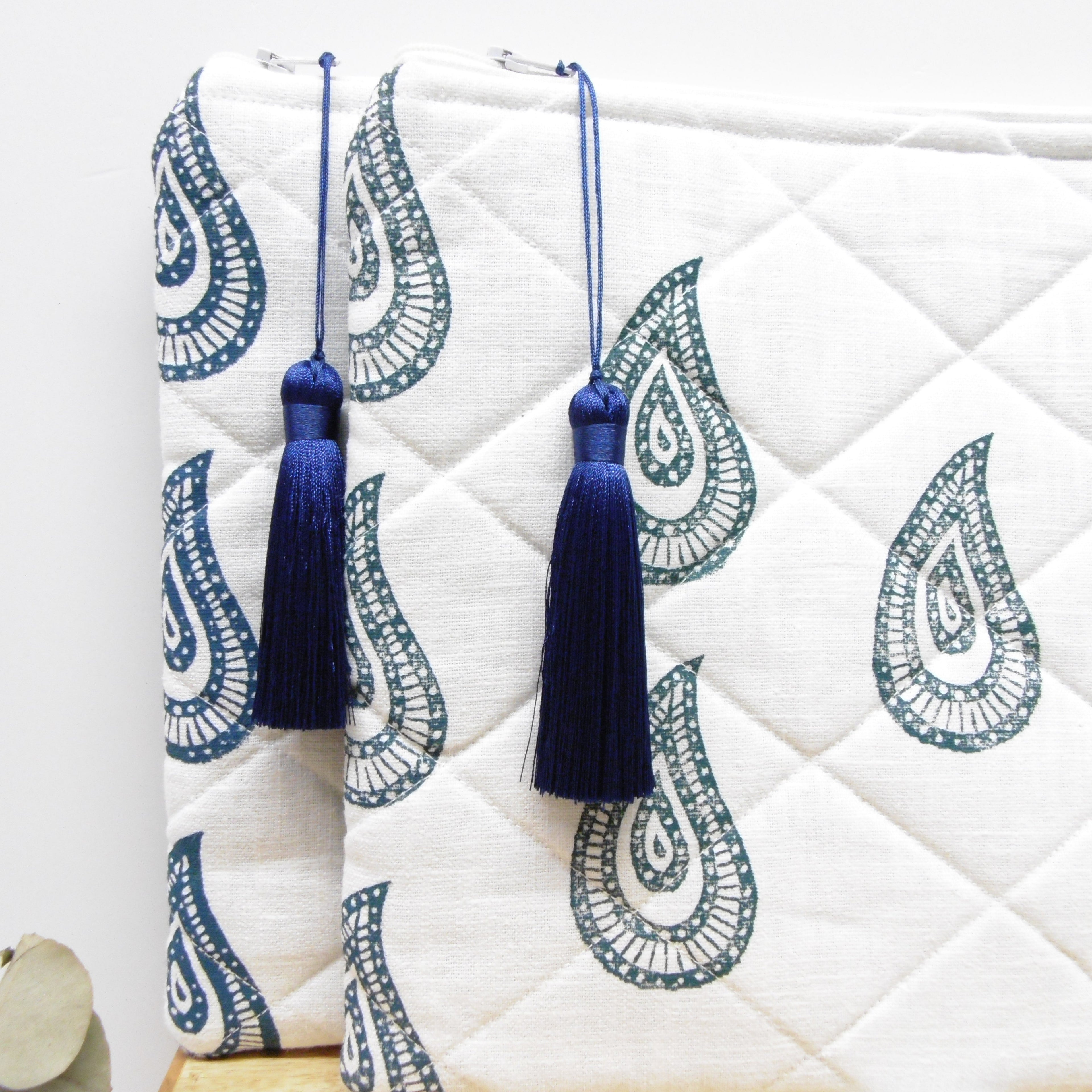 Quilted hand block printed pouches in multiple colours laid flat