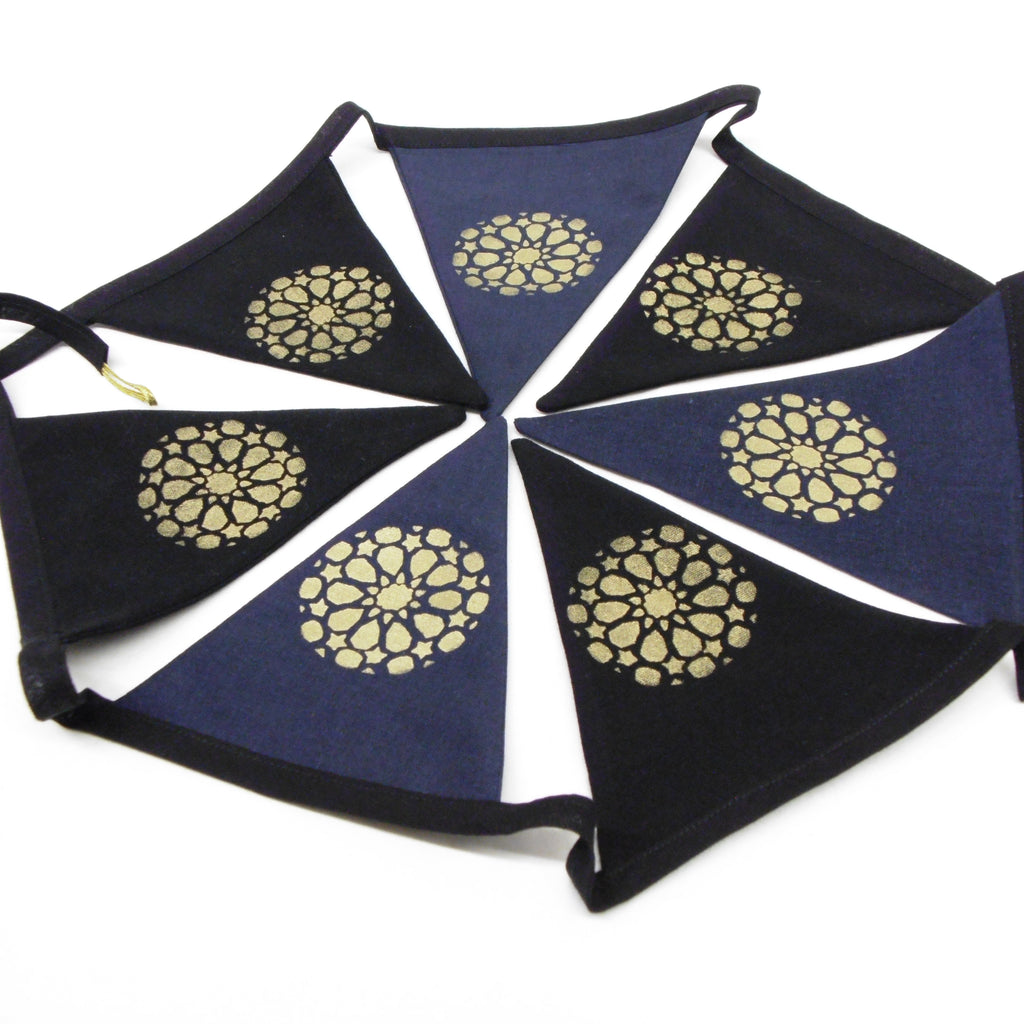 black and blue bunting with gold mandala design