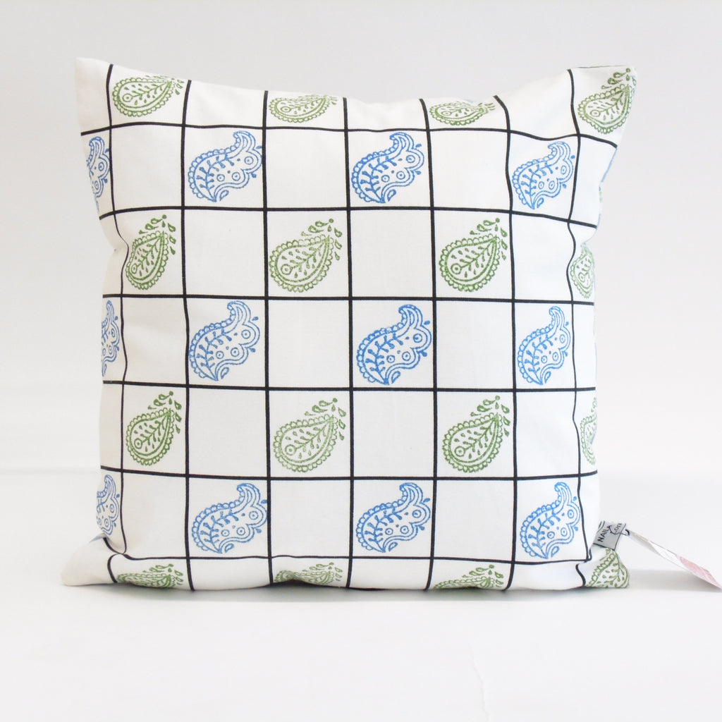 Decorative pillow with paisley pattern on a white background