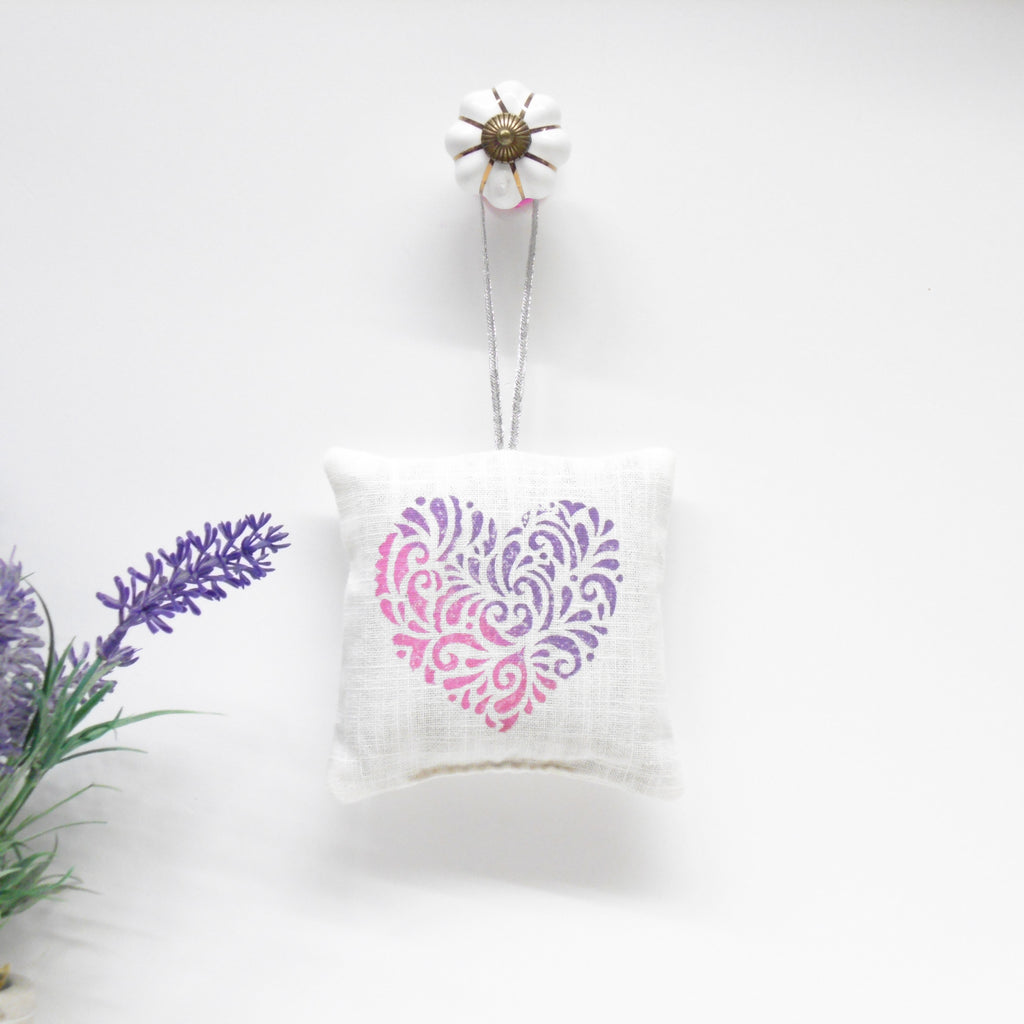 Decorative pillow with floral pattern on a white background