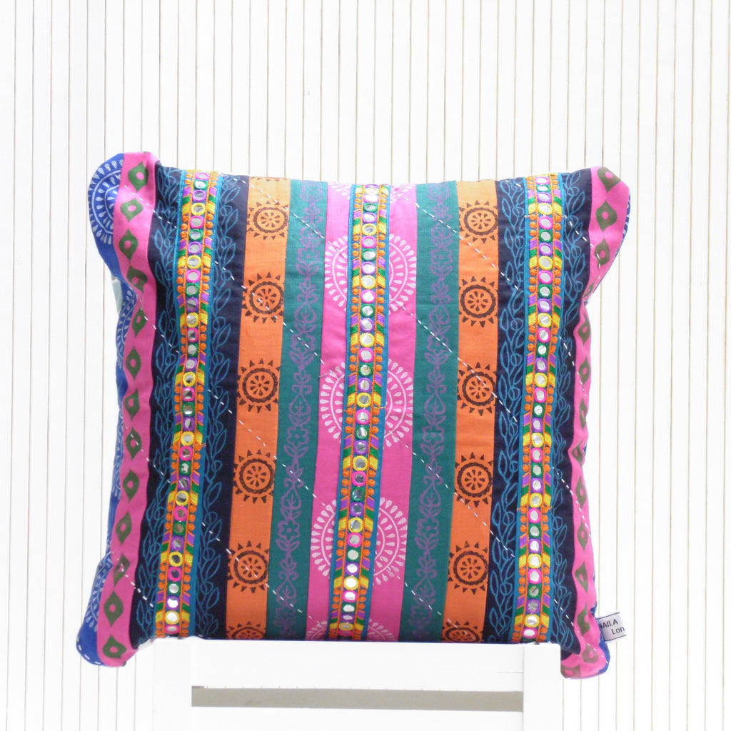 Colorful striped pillow with patterns on a white background