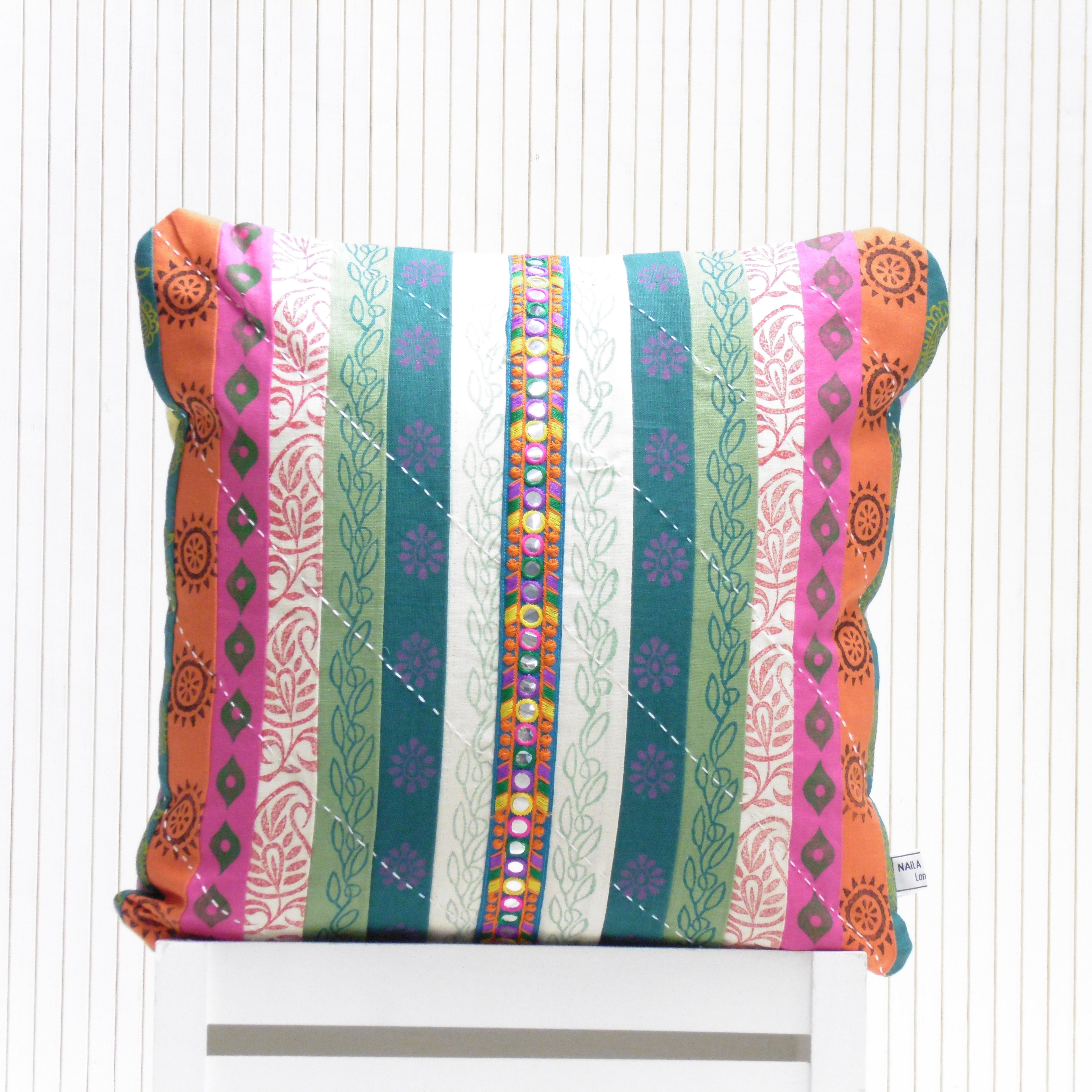 Colorful striped fabric with patterns on a white background